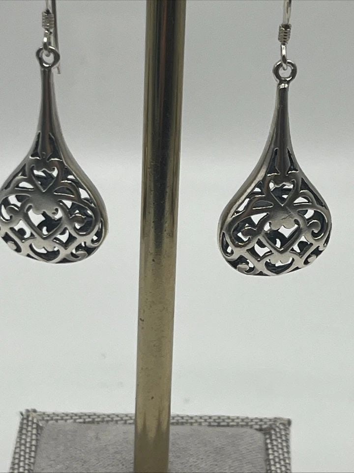 FILIGREE TEARDROP STERLING SILVER DANGLE EARRINGS: FILIGREE TEARDROP STERLING SILVER DANGLE EARRINGS FILIGREE TEARDROP STERLING SILVER DANGLE EARRINGS These earrings are elegant Filigree Teardrop Sterling Silver Hoops crafted with a metal purity of 92
