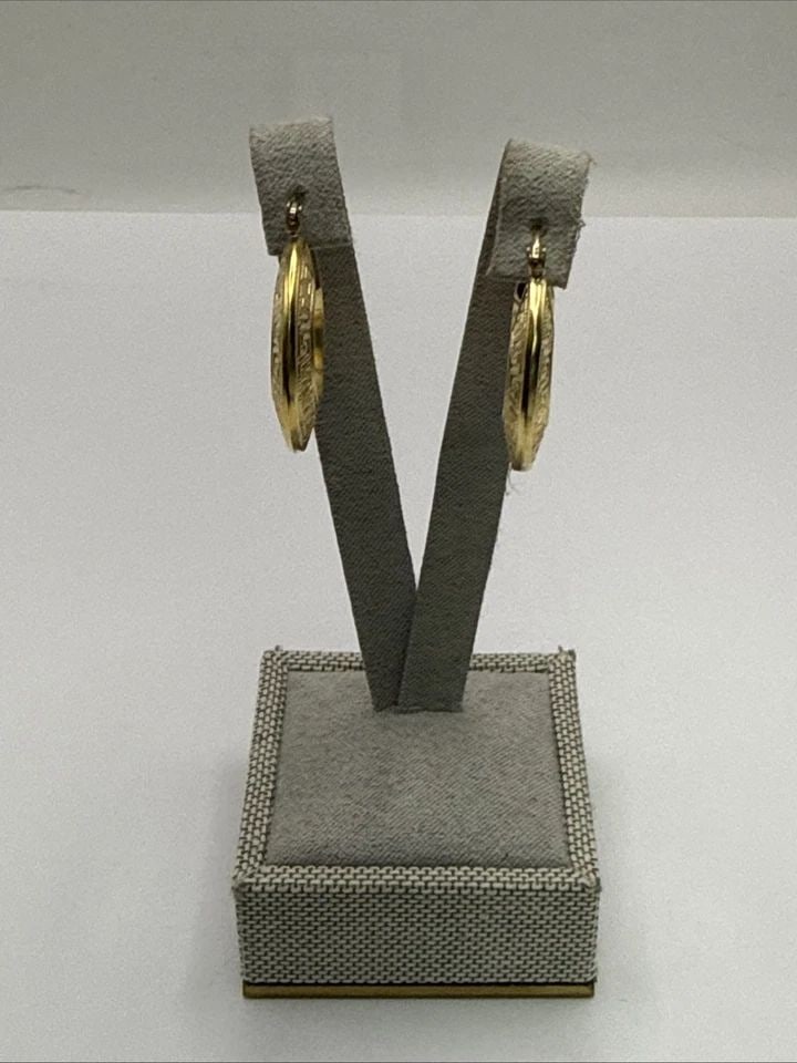 GOLD COLOR STERLING SILVER GREEK KEY HOOP EARRINGS 3.0 GRAMS: GOLD COLOR STERLING SILVER GREEK KEY HOOP EARRINGS 3.0 GRAMS These Gold Color Sterling Silver Greek Key Hoop Earrings are a stylish and elegant jewelry piece. Made from high-quality 925 sterling silve