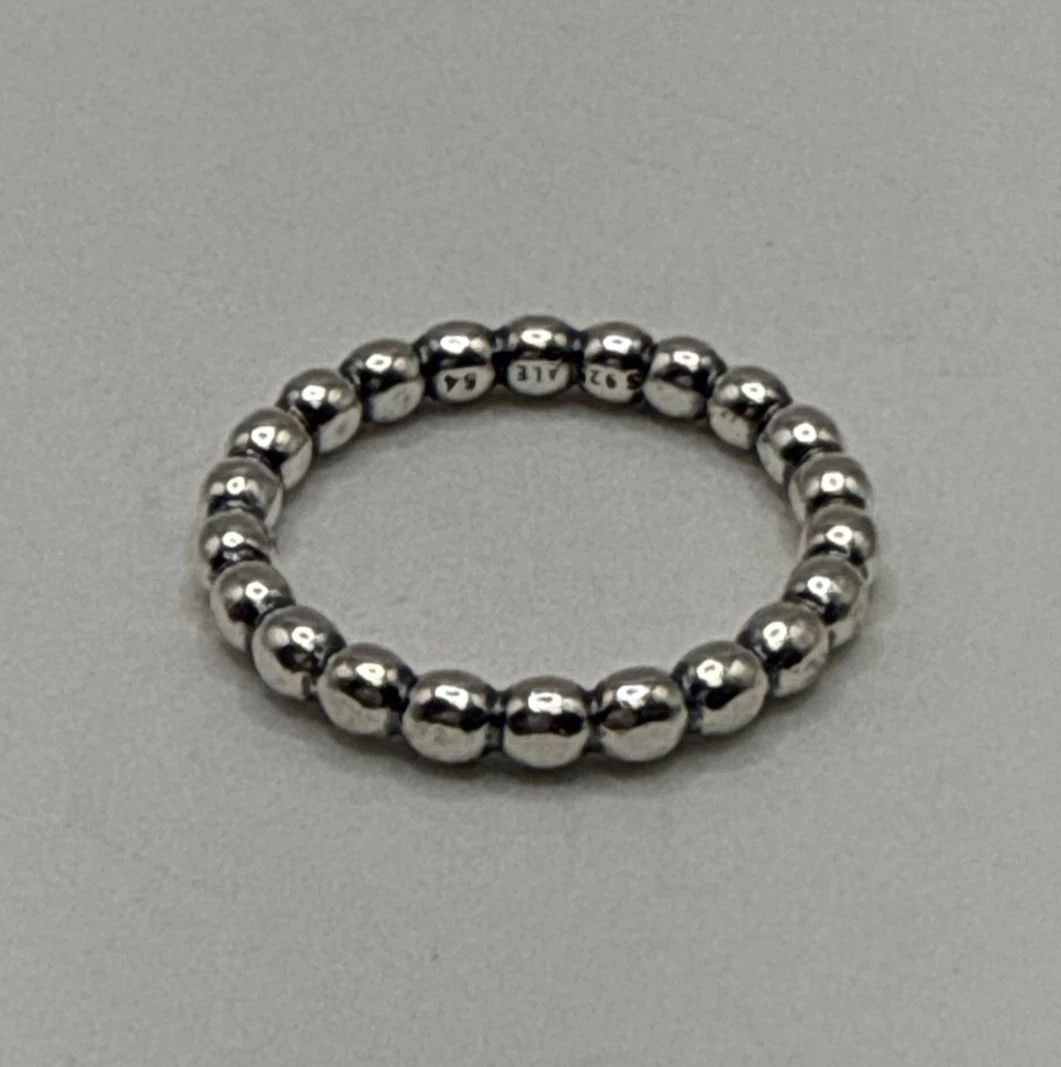 PANDORA STERLING SILVER BALL PATTERN ETERNITY BAND RING SIZE 6 3/4: PANDORA STERLING SILVER BALL PATTERN ETERNITY BAND RING SIZE 6 3/4 This Pandora Sterling Silver Ball Pattern Eternity Band Ring in size 6 3/4 is a beautiful and elegant piece of fine jewelry. Made fro