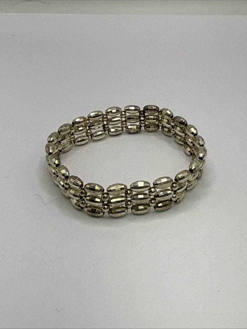 SILVER COLORED TRIPLE STRAND STRETCH BRACELET (1 of 2)