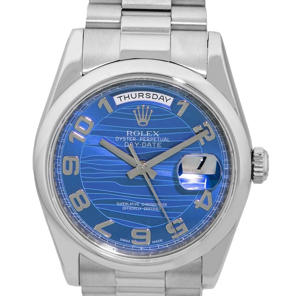 ROLEX PLATINUM 36MM DAY DATE PRESIDENT BLUE WAVE 118206 BOX LIFETIME WARRANTY: ROLEX PLATINUM 36MM DAY DATE PRESIDENT BLUE WAVE 118206 BOX LIFETIME WARRANTY ROLEX Platinum 36mm Day Date President Blue Wave 118206 Box Warranty Certified Pre-Owned Gent's Platinum 36mm Rolex Day-Da