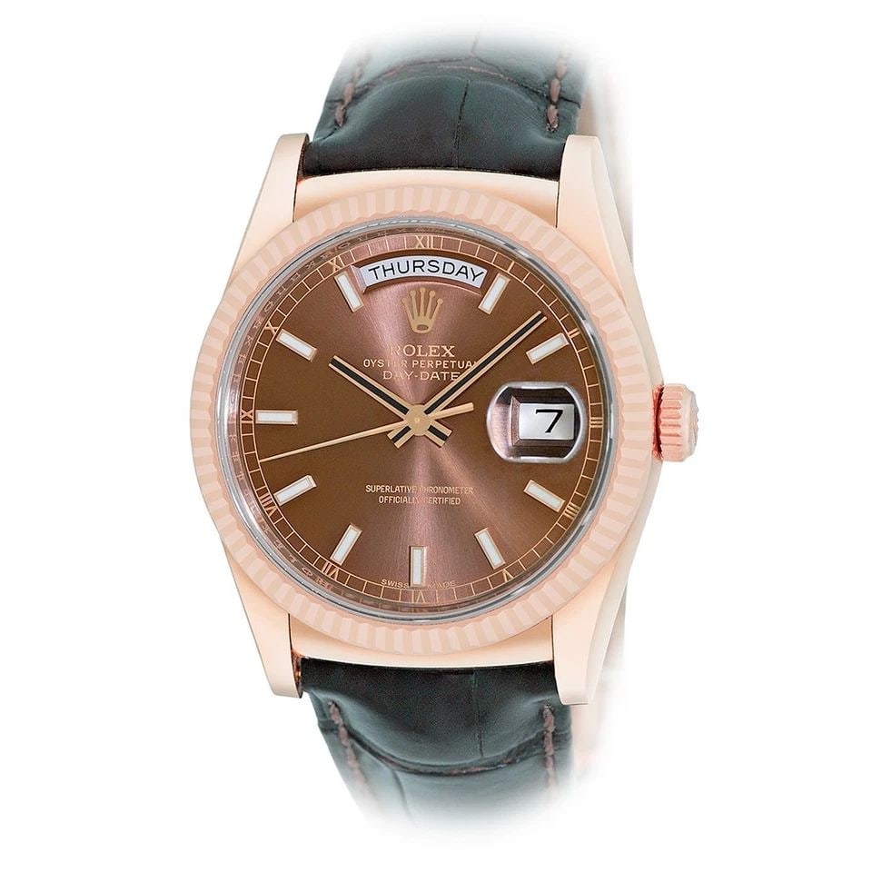 ROLEX 18K ROSE GOLD 36MM DAY-DATE 118135 BOX WARRANTY 2016: ROLEX 18K ROSE GOLD 36MM DAY-DATE 118135 BOX WARRANTY 2016 BRAND: Rolex Model: Day-Date Reference No: 118135 Case Measurements: Case Diameter: 36mm Case Thickness: 12mm Water Resistance: 100m / 330ft 