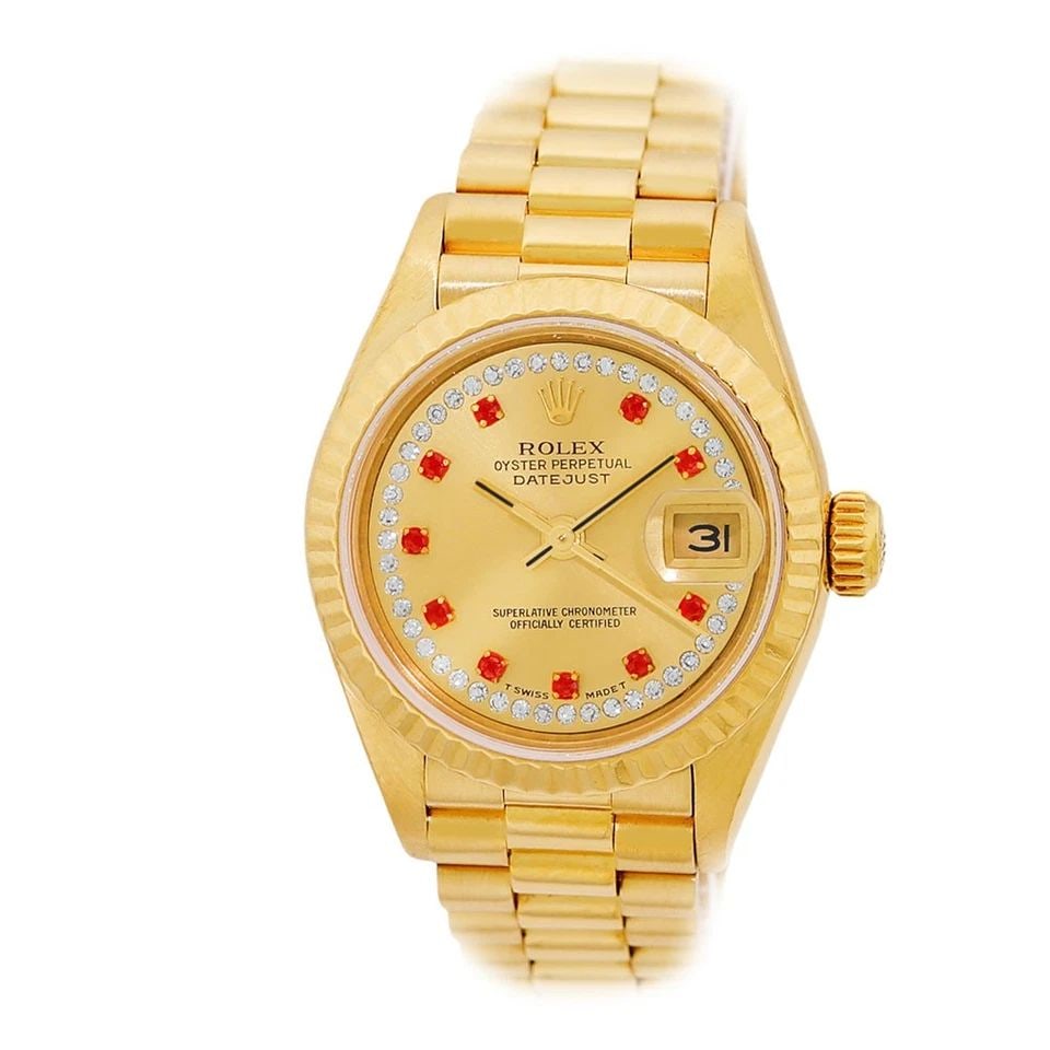 ROLEX 18K YELLOW GOLD 26MM PRESIDENT FACTORYRUBY DIAMOND DIAL 69178 BOX WARRANTY: ROLEX 18K YELLOW GOLD 26MM PRESIDENT FACTORYRUBY DIAMOND DIAL 69178 BOX WARRANTY BRAND: Rolex Model: President Reference No: 69178 Case Measurements: Case Diameter: 26mm Case Thickness: 10mm Water Res