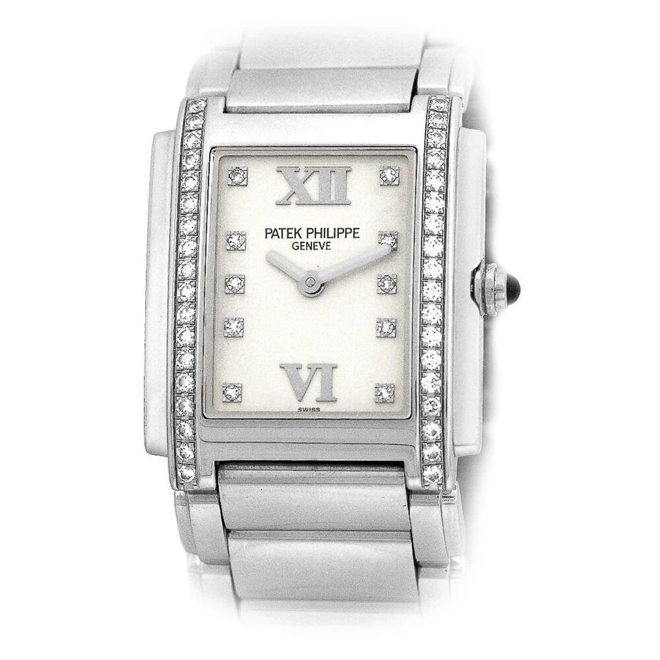 PATEK PHILIPPE STAINLESS STEEL 24 DIAMOND 4910 A TWENTY-4 BOX WARRANTY MINTY: PATEK PHILIPPE Stainless 25mm Diamond 4910 Twenty 4 Box 24 Warranty 4910/10A MINTY Lady's Stainless Steel 25mm Patek Philippe Diamond "Twenty- 4" Item #: CT37927 BRAND Patek Philippe Model: Twenty- 4 