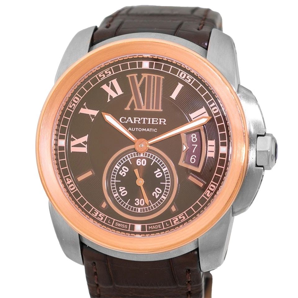 CARTIER ROSE GOLD AND STEEL 42MM "CALIBRE DE CARTIER" W7100051-3389 BOX WARRANTY: CARTIER ROSE GOLD AND STEEL 42MM "CALIBRE DE CARTIER" W7100051-3389 BOX WARRANTY BRAND: Cartier Model: Calibre de Cartier Reference No: W7100051 - 3389 Gender: Gent’s Movement: Handmade Automatic Mo