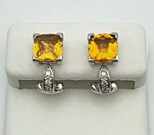 14K WHITE GOLD EARRINGS WITH CITRINE AND 0.06CTW DIAMONDS 3.4G OMEGA BACKS: 14K WHITE GOLD EARRINGS WITH CITRINE AND 0.06CTS OF DIAMONDS 3.4G OMEGA BACKS 14k White Gold Earrings with Citrine and 0.06cts of Diamonds Condition: Used, have been cleaned Material: 14k White Gold W