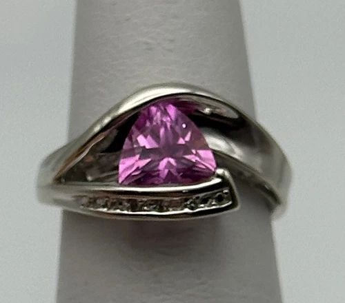 10K WHITE GOLD RING, LAB-CREATED SAPPHIRE, DIAMONDS (SIZE 4.75) 2.8 GRAM: 10k White Gold Ring, Lab Made Pink Sapphire, 0.015cts of Diamonds Condition: Used Material: 14k White Gold Ring Size: 4.75 Weight: 2.8 grams Top Width: 10mm Bottom Width: 1.3mm Stone Info: 1.75ct lab 