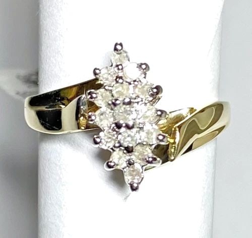 NEW 10K GOLD CLUSTER RING, 0.25CTW NATURAL DIAMONDS (SIZE 6.25) 3 GRAMS: WOMEN'S 10K YELLOW GOLD RING AND 0.25CT CLUSTER DIAMONDS (SIZE 6.25) Women's 10k Yellow Gold Ring and 0.25CT Cluster Diamonds (Size 6.25) You are bidding on a new with tags Women's 10k Yellow Gold Rin