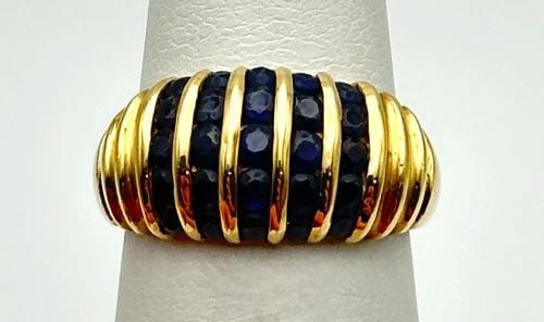 10K GOLD RING WITH 1.00CTW NATURAL SAPPHIRES (SIZE 4.75) 3.1 GRAM: 10K GOLD RING SET WITH 1.00CTW OF NATURAL SAPPHIRES SIZE: 4.75 10k Gold Ring set with 1.00ct of Natural Sapphires Condition: Used Material: 10k Yellow Gold Ring Size: 4.75 Weight: 3.1 grams Top Width: