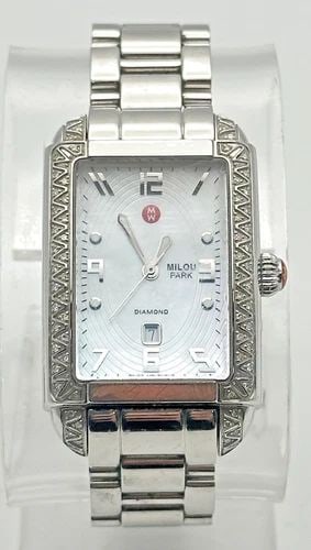 MICHELE MILOU PARK WOMEN'S DIAMOND WATCH: MICHELE MILOU PARK WOMEN'S DIAMOND WATCH Michele Milou Park women's diamond watch You are bidding on a pre-owned women's Michele watch. Retail price $1500. The watch is in excellent working condition.