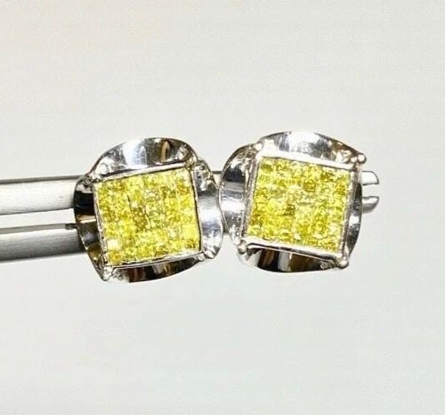 14K WHITE GOLD EARRINGS WITH 0.35CTW YELLOW DIAMONDS 2.4 GRAM: 14K WHITE GOLD EARRINGS WITH 0.35CTS YELLOW DIAMONDS 14k White Gold Earrings with 0.35CTS Yellow Diamonds You are bidding on a pre-owned 14k White Gold Earrings with 0.35CTS Yellow Diamonds. The earri