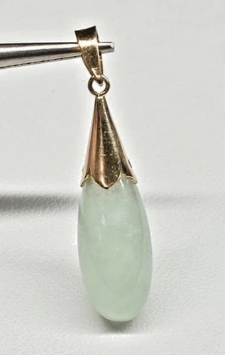14K GOLD PENDANT WITH GENUINE LIGHT GREEN JADE, DROP SHAPED 3 GRAMS: WOMEN'S 14K YELLOW GOLD PENDANT WITH GENUINE JADE Women's 14k Yellow Gold Pendant with Genuine Jade You are bidding on a pre-owned Women's 14k Yellow Gold Pendant with Genuine Jade. The pendant has mi