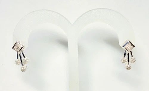 14K WHITE GOLD DANGLE STYLE EARRINGS WITH 0.25CTW NATURAL DIAMONDS 2.7 GRAMS: WOMEN'S 14K WHITE GOLD EARRINGS WITH 0.25CTS DIAMONDS Women's 14k White Gold Earrings with 0.25CTS Diamonds You are bidding on a pre-owned Women's 14k White Gold Earrings with 0.25CTS Diamonds. The ea