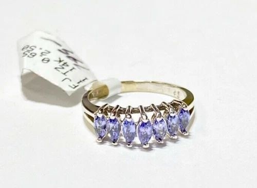 NEW WOMEN'S 14K WHITE GOLD RING WITH 0.65CTW TANZANITE (SIZE 5.75) 2.5 GRAM: WOMEN'S WHITE GOLD RING WITH 0.65CTS TANZANITE (SIZE 5.75) Women's White Gold Ring with 0.65CTS Tanzanite (Size 5.75) You are bidding on a new with tags Women's White Gold Ring with 0.65CTS Tanzanite.