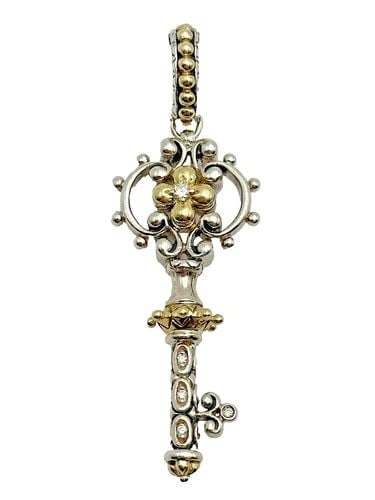 BARBARA BIXBY SILVER KEY PENDANT WITH 18K GOLD ACCENTS AND 0.04CTS OF DIAMONDS: Barbara Bixby Silver Key Pendant with 18k Gold Accents and 0.04cts of Diamonds Condition: Used Material: 925 Sterling Silver for the main body, with 18k Yellow Gold accents Pendant Weight: 6.3 grams P