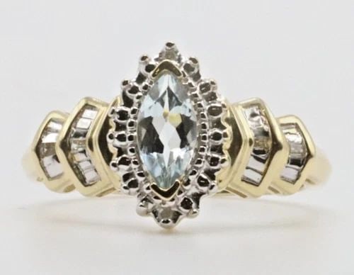 10K YELLOW GOLD RING WITH MARQUISE AQUAMARINE AND DIAMONDS (SIZE 7.25) 2.9 GRAM: 10K YELLOW GOLD RING WITH CENTER MARQUISE AQUAMARINE AND DIAMONDS SIZE: 7.25 10k Yellow Gold Ring with center Marquise Aquamarine and Diamonds You are bidding on a 10k Yellow Gold Ring with center Mar
