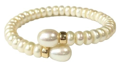 WHITE PEARL BANGLE WITH 14K YELLOW GOLD ACCENTS (6 INCH) 15.4 GRAMS: WHITE PEARL BANGLE WITH 14K ACCENTS (6 INCH WRIST) White Pearl Bangle with 14k Accents You are bidding on a White Pearl Bangle with 14k Accents. Bracelet is in good condition but one of the gold accen