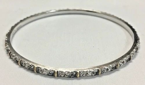 GABRIEL & CO STERLING SILVER BANGLE WITH 18K GOLD ACCENTS 35916-5 ( 16.4 GRAM ): GABRIEL & CO STERLING SILVER BANGLE WITH 18K GOLD 35916-5 Gabriel & Co sterling silver bangle with 18k gold 35916-5 You are bidding on a new with defects Gabriel & Co sterling silver bangle with 18k g