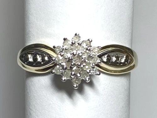 NEW 10K YELLOW GOLD CLUSTER RING WITH 0.20CTW DIAMONDS (SIZE 7.25) 2.3 GRAM: WOMEN'S 10K YELLOW GOLD CLUSTER RING WITH 0.20CT DIAMONDS (SIZE 7.25) Women's 10k Yellow Gold Cluster Ring with 0.20CT Diamonds (Size 7.25) You are bidding on a new with tags Women's 10k Yellow Gold C