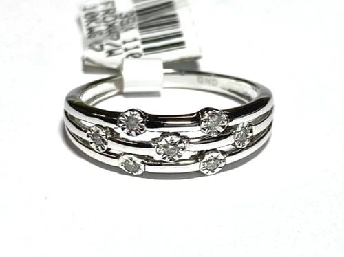 NEW 10K WHITE GOLD RING WITH 0.07CTW DIAMONDS (SIZE 6.75) 2.2 GRAM: WOMEN'S 10K WHITE GOLD RING WITH 0.07CT DIAMONDS (SIZE 6.75) Women's 10k White Gold Ring with 0.07CT Diamonds (Size 6.75) You are bidding on a new with tags Women's 10k White Gold Ring with 0.07CT Dia