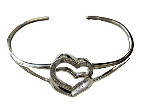 925 STERLING SILVER HEART BANGLE BRACELET WITH 0.25CTW DIAMONDS 7.7 GRAMS: STERLING SILVER BRACELET WITH DIAMONDS Sterling Silver Bracelet with Diamonds You are bidding on a pre-owned Sterling Silver Bracelet with Diamonds. There are few minor scratches on the bracelet from 