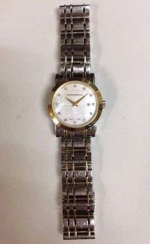WOMAN'S BURBERRY BU1375 MOP DIAL 28MM: WOMAN'S BURBERRY BU1375 STONE DIAL Woman's Burberry BU1375 You are bidding on a pre-owned Woman's Burberry BU1375 watch. The watch is in excellent working condition. There are some scratches on the wa