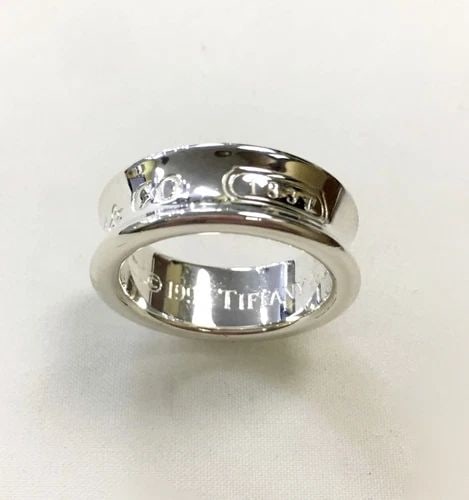 TIFFANY & CO. 1837 SILVER RING (SIZE 5.25) 7.4 GRAM: TIFFANY & CO. 1837 SILVER RING (SIZE: 5.25) Tiffany & Co. 1837 Silver Ring You are bidding on a Tiffany & Co. 1837 Silver Ring. The ring has been fully buffed and restored by our in house jewelers, bu