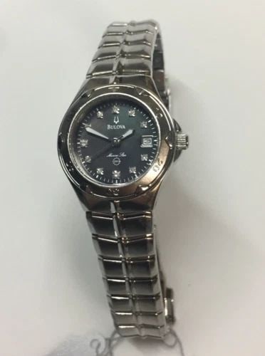 BULOVA 96P12 WOMEN'S WATCH BLACK MOTHER OF PEARL MARINE STAR DIAMONDS: BULOVA 96P12 LADIES WATCH BLACK MOTHER OF PEARL MARINE STAR DIAMONDS Bulova 96P12 Ladies Watch Black Mother Of Pearl Marine Star Diamonds You are bidding on a pre-owned Bulova 96P12 Ladies Watch Black
