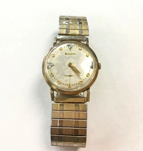 VINTAGE BULOVA 10K GOLD FILLED, STRETCH BAND WATCH (1 of 2)