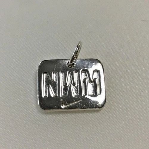 TIFFANY & CO. STERLING SILVER 2011 NIKE WOMEN'S MARATHON PENDANT (1 of 2)