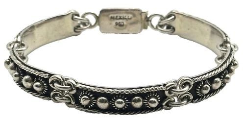 950 MEXICO SILVER LINKED BRACELET WITH ANTIQUING 7.5MM ( 7 INCH ) 25 GRAMS: 950 MEXICO SILVER BRACELET 7 INCHES 7.5MM 25 GRAMS 950 Mexico Silver Bracelet Condition: Used, has been cleaned Material: 950 Silver Weight: 25 grams Bracelet Size: 7 inches long, 7.5mm wide Bracelet 