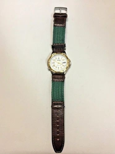 GUESS INDIGLO 1995 WITH YELLOW GOLD TONE BEZEL COLOR WATCH 36MM (1 of 2)