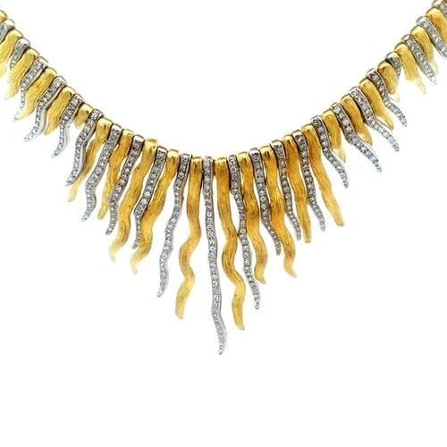 DIAMOND GOLD SUNBURST BIB NECKLACE 18K TWO TONE PAVE SET TEXTURED 14K CHAIN: DIAMOND GOLD SUNBURST BIB NECKLACE 18K TWO TONE PAVE SET TEXTURED 14K CHAIN The diamond and gold necklace is a stunning piece of fine jewelry featuring 18k yellow and white gold fur textured style lon