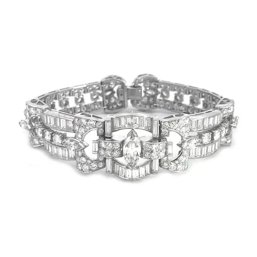 DIAMOND PLATINUM BRACELET 16 CARATS ASSORTED SHAPE OPEN DESIGN ART DECO: DIAMOND PLATINUM BRACELET 16 CARATS ASSORTED SHAPE OPEN DESIGN ART DECO This exquisite diamond bracelet is crafted from platinum. The wide centerpiece to tapered band is full decorated with assorted s