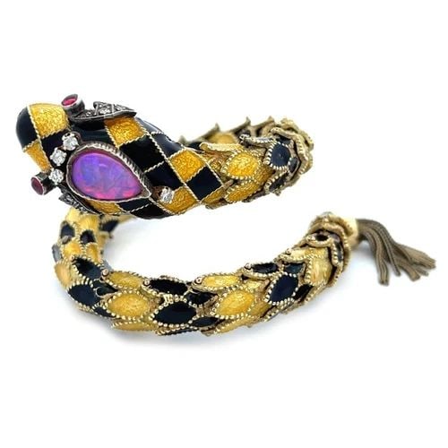 DIAMOND OPAL GARNET & ENAMEL 14K YELLOW GOLD SNAKE WRAP BRACELET: DIAMOND OPAL GARNET & ENAMEL 14K YELLOW GOLD SNAKE WRAP BRACELET This is a unique style fashionable vintage wrap bracelet; it is crafted from 14k yellow gold featuring a long-coiled snake featuring la