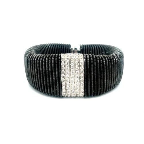 DIAMOND GOLD FLEX BRACELET 18K WHITE DARK TONE TAPERED EXPANSION BAND: DIAMOND GOLD FLEX BRACELET 18K WHITE DARK TONE TAPERED EXPANSION BAND The Diamond Gold Flex Bracelet is a stunning piece of fine jewelry crafted with 18k white gold and featuring natural white diamond