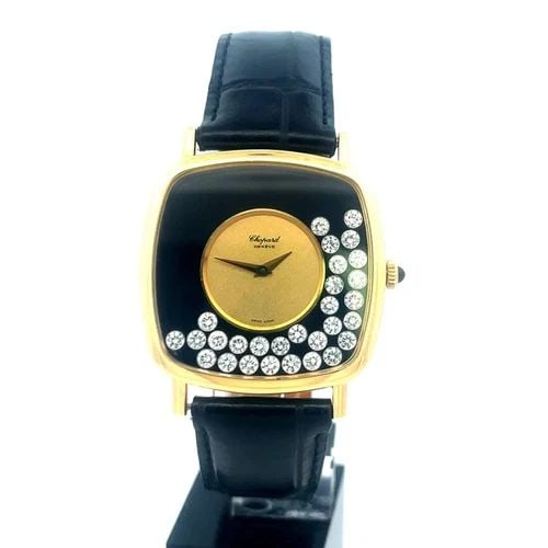 CHOPARD HAPPY DIAMOND GOLD MEN'S WRISTWATCH 18K YELLOW DIAL LEATHER BAND #2106: Gorgeous and authentic from the Happy Diamond Collection by Chopard, this unisex wristwatch is a harmonious blend of luxury and playful sophistication, it features a 32mm yellow gold case and compleme