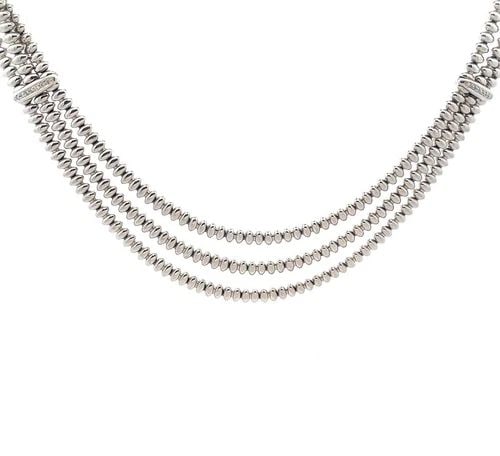 CHIAMPESAN DIAMOND 18K GOLD NECKLACE WHITE TRIPLE ROW COLLAR STYLE: CHIAMPESAN DIAMOND 18K GOLD NECKLACE WHITE TRIPLE ROW COLLAR STYLE This is a stunning necklace by Chiampsean, it is crafted from 18k white gold featuring 3 rows with oval shape high polished chasing b
