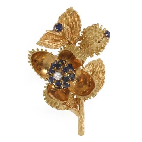 TIFFANY & CO. DIAMOND SAPPHIRE 18K GOLD FLORAL MOVABLE BROOCH: TIFFANY & CO. DIAMOND SAPPHIRE 18K GOLD FLORAL MOVABLE BROOCH Tiffany & Co. Diamond Sapphire 18k Gold Floral Movable Brooch Description This lovely vintage brooch is authentic and from Tiffany & Co. I