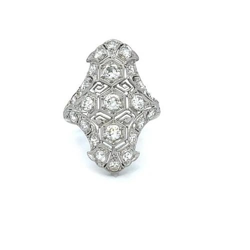 4988 ART DECO PLATINUM DIAMONDS ELONGATED OPEN STYLE RING SIZE 6.5: 4988 ART DECO PLATINUM DIAMONDS ELONGATED OPEN STYLE RING SIZE 6.5 This lovely Art Deco ring is crafted from platinum. The front has an elongated shape with scallop edge on both ends. The center of th