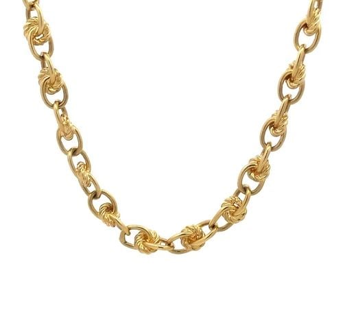 YELLOW GOLD 18K LINK CHAIN FANCY OVAL CABLE LINK INTERLACE STYLE 66G 28": YELLOW GOLD 18K LINK CHAIN FANCY OVAL CABLE LINK INTERLACE STYLE 66G 28" This is a unique style long chain, it is crafted from 18k yellow gold featuring set of two wire oval links interlaced with a ca