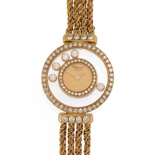 CHOPARD HAPPY DIAMOND WATCH 18K YELLOW GOLD 4 CHAINS BAND: Chopard Happy Diamond 1ct 18k Yellow Gold 4 Chain Ladies Watch LIQUIDATION Description This is an authentic ladies quartz wrist watch by Chopard from the Happy Diamond Collection. The double round sha