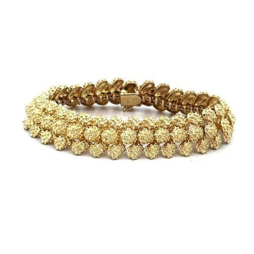 GOLD TEXTURED SEA BRACELET 14K UNDERWATER CORAL REEF DESIGN 1970'S: GOLD TEXTURED SEA BRACELET 14K UNDERWATER CORAL REEF DESIGN 1970'S This is a an eye-catching 14k yellow gold bracelet from the 1970's. It features an under the sea life with textured pear shaped links