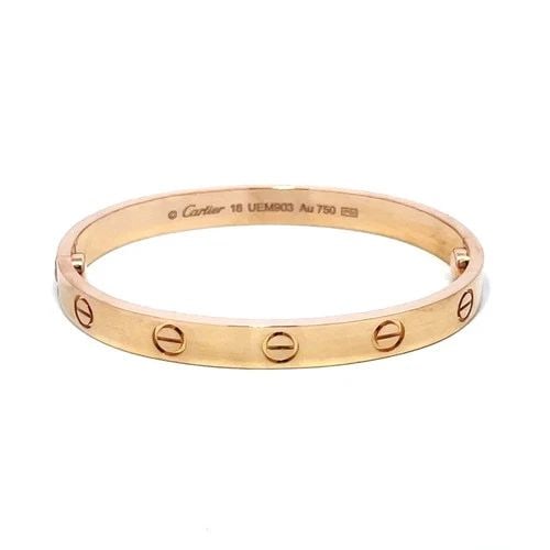 CARTIER LOVE GOLD BANGLE CLASSIC MODEL 18K ROSE SIZE 16 BOX & PAPER: CARTIER LOVE GOLD BANGLE CLASSIC MODEL 18K ROSE SIZE 16 BOX & PAPER This elegant bangle is by Cartier, from 18k rose gold, it features a screw closure and signed by the brand. This classic model bangl