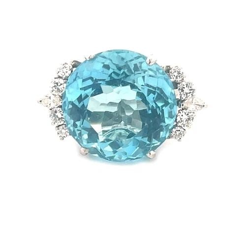 AQUAMARINE DIAMOND GOLD RING 12K WHITE LARGE COCKTAIL SPLIT SHANK: This is a stunning vintage cocktail ring, it is a piece of fine jewelry featuring a large round shaped aquamarine gemstone in the center with around and marquise shape sparling diamond accent on each 