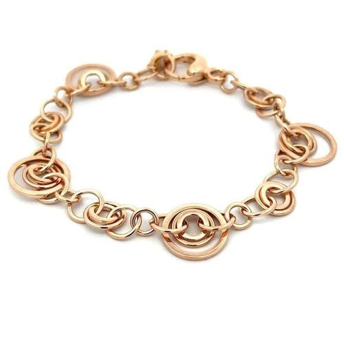 CHOPARD BRACELET 18K ROSE GOLD DIAMOND ASSORTED SIZE MULTI-RING LINKS: CHOPARD BRACELET 18K ROSE GOLD DIAMOND ASSORTED SIZE MULTI-RING LINKS This charming authentic bracelet is from Chopard, it is crafted from 18k rose gold with a polished finish featuring wire round lin