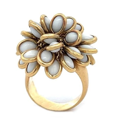 DESIGNER C. AMORIM 18K YELLOW GOLD MOVABLE PETALS FLORAL RING: DESIGNER C. AMORIM 18K YELLOW GOLD MOVABLE PETALS FLORAL RING This beautiful movable ring crafted from 18k yellow gold with a satin finish on a wide dome shape tapered band. On the top of the shank is