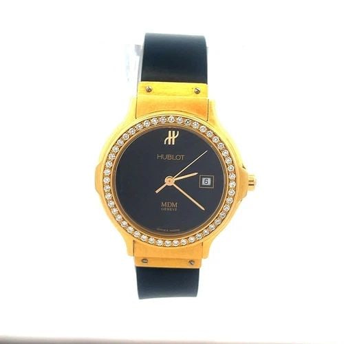 HUBLOT MDM GOLD LADIES WATCH 18K YELLOW DIAMOND BEZEL DATE RUBBER BAND 28MM: HUBLOT MDM GOLD LADIES WATCH 18K YELLOW DIAMOND BEZEL DATE RUBBER BAND 28MM This is a beautiful classic vintage Hublot women wristwatch, the case, lugs, crown and double fold clasp are crafted from 18
