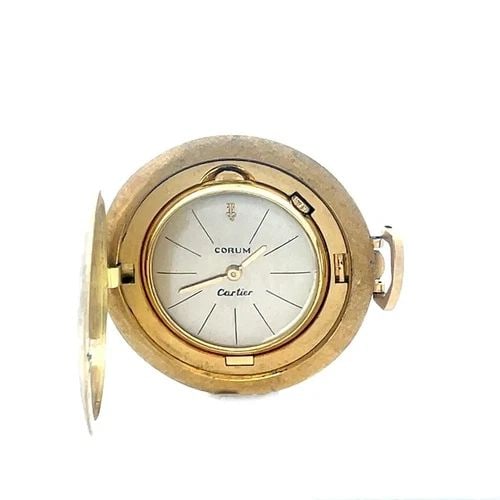 CORUM CARTIER GOLD POCKETWATCH 18K YELLOW FULL HUNTER VINTAGE: This is a vintage 18k yellow gold full hunter pocket watch by Corum for Cartier the case has a textured brush finish and the watch inside the case is 26mm with acrylic cover, champagne color face with
