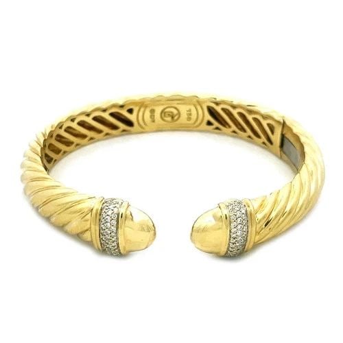DAVID YURMAN GOLD CUFF BRACELET DIAMOND 18K YELLOW WIDE CABLE FLEX BAND: DAVID YURMAN GOLD CUFF BRACELET DIAMOND 18K YELLOW WIDE CABLE FLEX BAND The product is a stunning 18k yellow gold cuff bracelet by David Yurman featuring an oval shape. The bracelet has a pavé set di